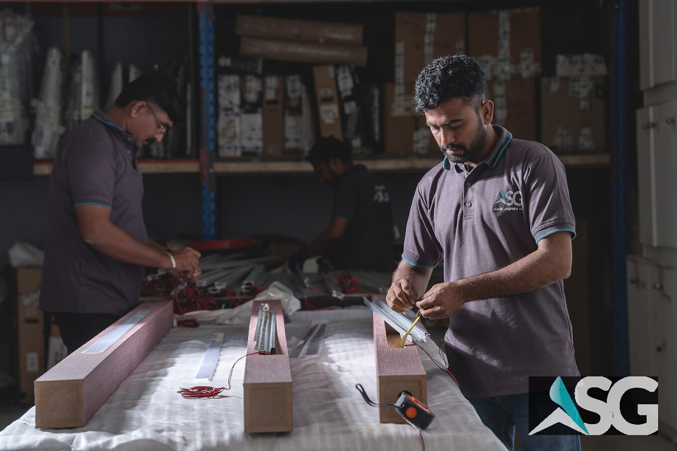 ASG craftsman working on a fabrication detail in the workshop